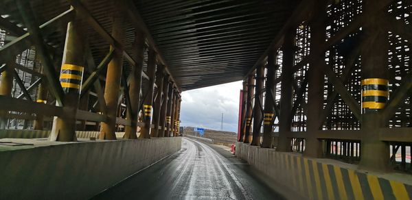 View of bridge over road in city