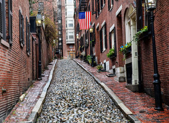 Old cobblestone road path on historic city street