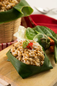 Close-up of food on cutting board at table