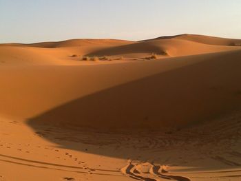 Scenic view of desert against sky