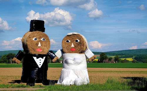 View of toys on field against sky