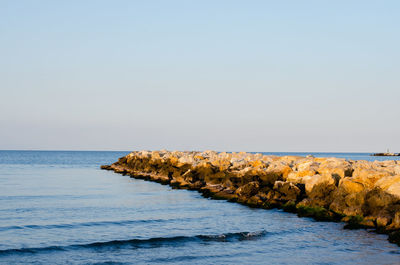 Scenic view of sea against clear sky