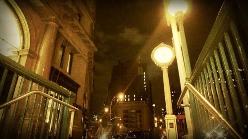 Low angle view of illuminated building at night