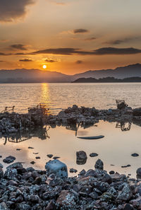 Scenic view of sea against sky during sunset