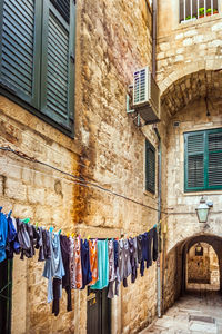 Clothes drying outside building
