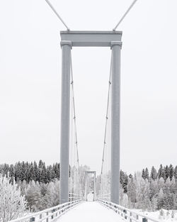 Bridge against clear sky during winter