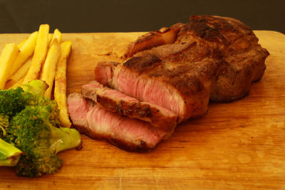 High angle view of meat on cutting board