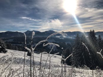 Scenic view of snowcapped mountains against sky