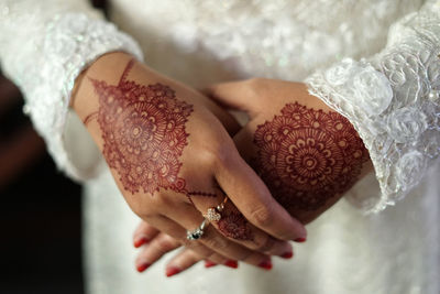 Close-up of woman holding hands