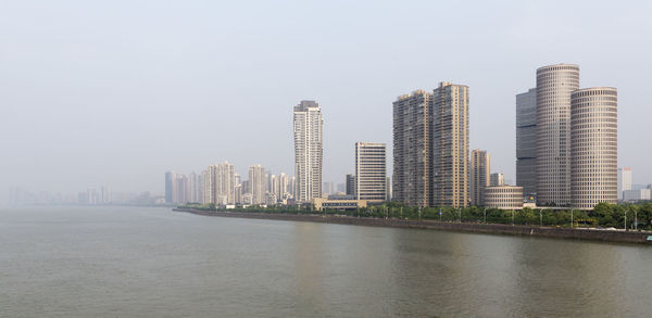 Modern buildings by qiantang river in hangzhou, china