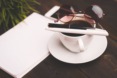 Close-up of coffee cup on table