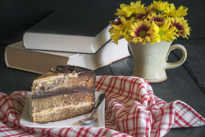 Close-up of cake slice in plate on table