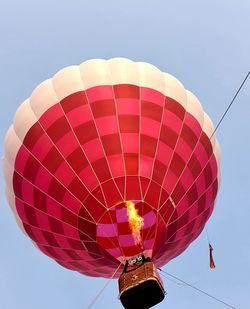 Low angle view of hot air balloon against clear sky