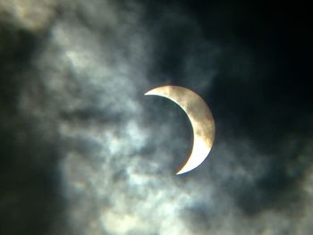 Low angle view of moon against sky at night