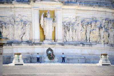 Statue of buddha outside building