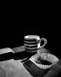 Close-up of coffee cup on table