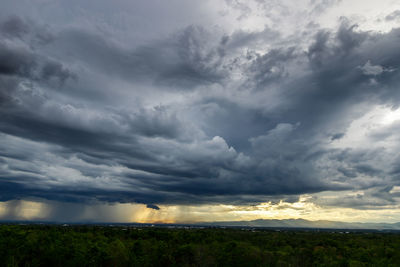 Scenic view of dramatic sky over land