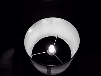 Low angle view of illuminated electric lamp