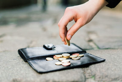 Close-up of hand holding jigsaw piece