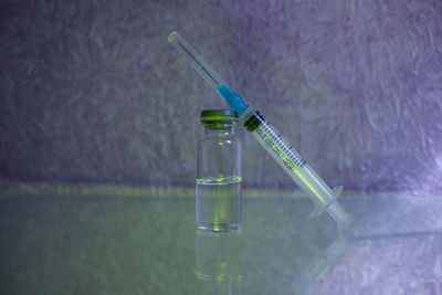 Close-up of glass on wall