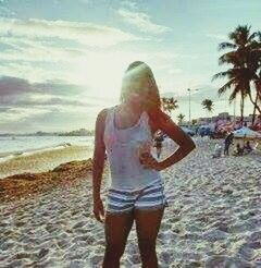 Woman standing on beach