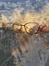 Low section of man with reflection in water