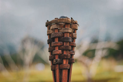Torch lamp made of woven bamboo