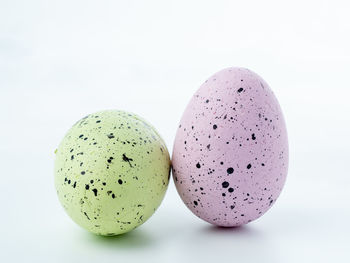 Close-up of egg against white background