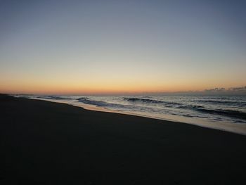 Scenic view of beach during sunset