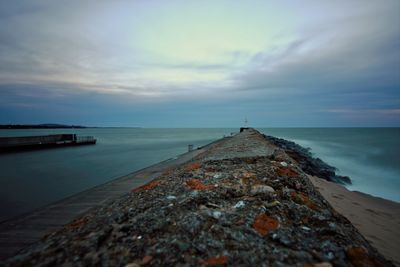 Scenic view of sea against sky at sunset