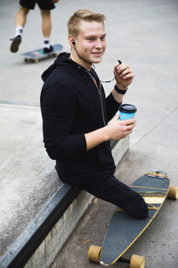 Handicapped man on skateboard