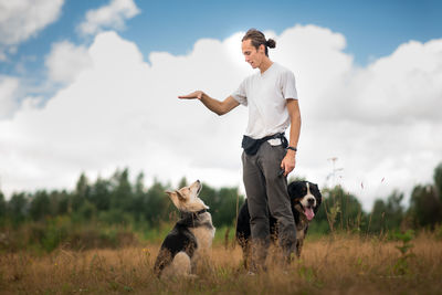 Full length of a dog on field