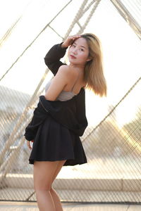 High angle view of young woman sitting at home