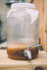 Kombucha scoby in the brewing glass jar