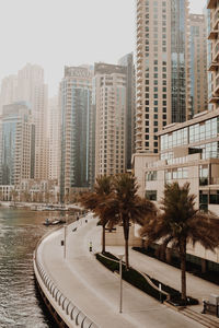 Modern buildings in city against sky