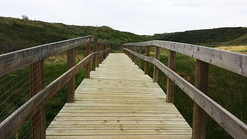 View of wooden footbridge