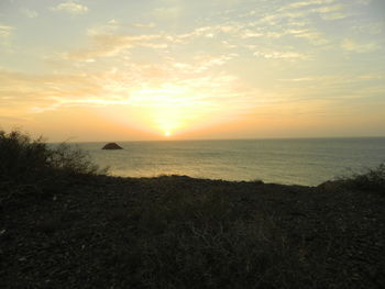 Scenic view of sea against sky during sunset