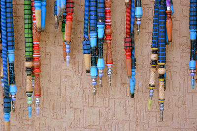 High angle view of multi colored pencils in row