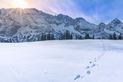 Snow covered mountain against sky