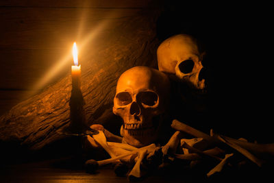 Lit candles in the dark