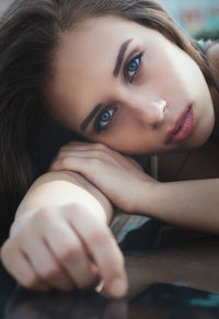 Close-up portrait of young woman