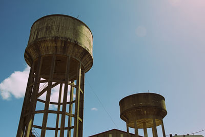 Low angle view of water tower against sky