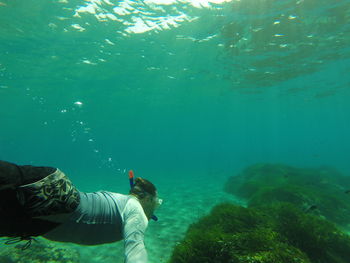 Man swimming in sea