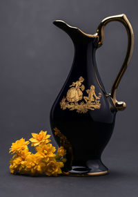 Close-up of yellow flowers on table