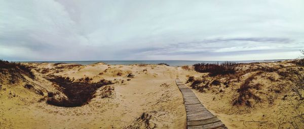 Scenic view of beach against sky