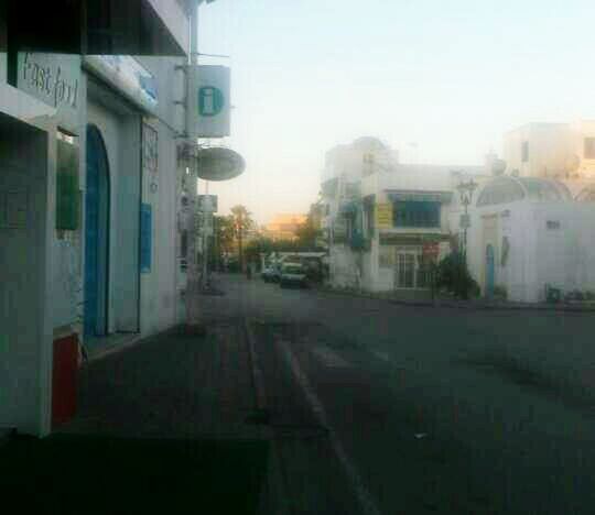 CARS ON STREET IN CITY