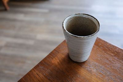 High angle view of coffee cup on table