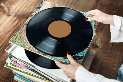 Listening to music from vinyl record. playing music. retro music party. vintage style. analog sound