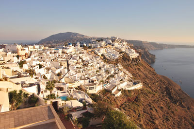 Scenic view of sea with mountain range in background