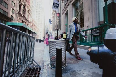 Man standing in front of building